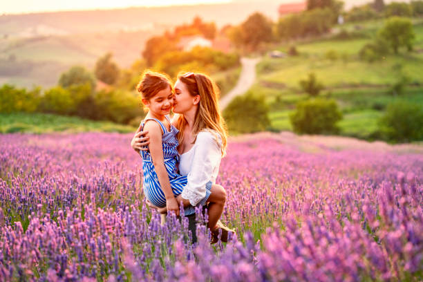 istock Happy family in lavender field 1256106076