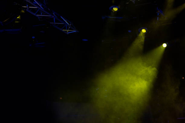 istock lights spotlights and smoke over the stage 1256107084