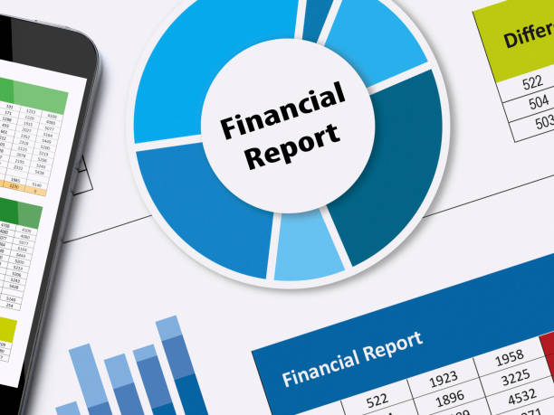 Financial report Financial papers and mobile phone financial report stock pictures, royalty-free photos & images