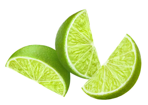 istock Delicious lime slices close-up on white 1256108974