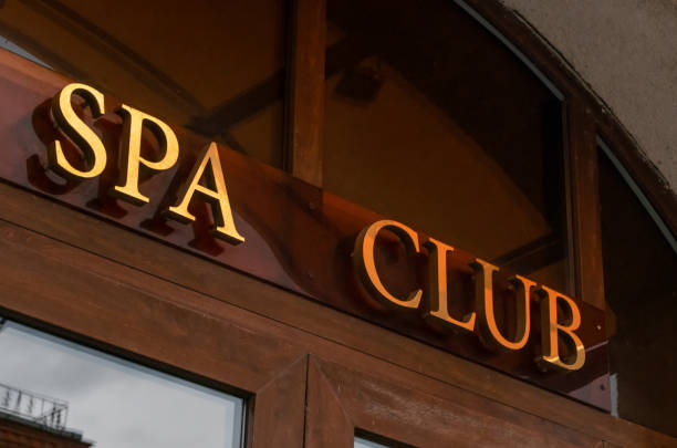 istock Sign on the building Spa Club close up 1256109989