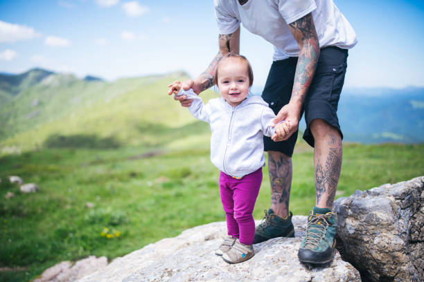 istock Father Walking With Toddler In The Mountains. 1256112308