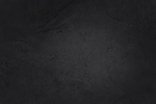 istock Dark grey black slate texture in natural pattern with high resolution for background and design art work. Black stone wall. 1256112971