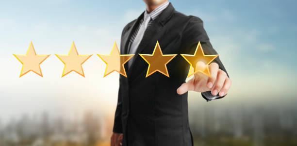 istock Hand of touching rise on increasing five stars. Increase rating evaluation 1256114945