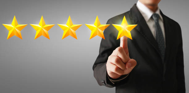 istock Hand of touching rise on increasing five stars. Increase rating evaluation 1256114949