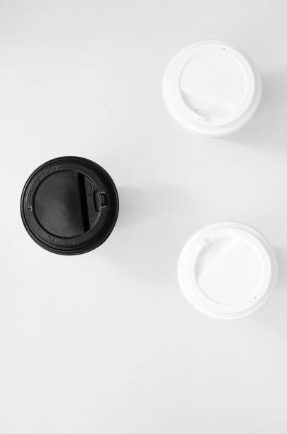 istock paper cups for coffee on a white background top view. waste recycling 1256116777