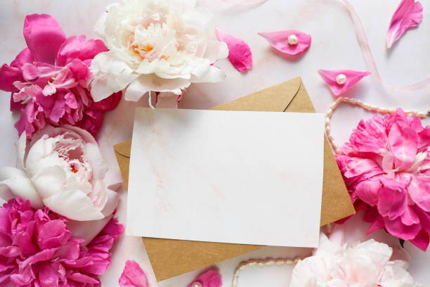 istock postcard mockup. pink peonies on a white background 1256117531