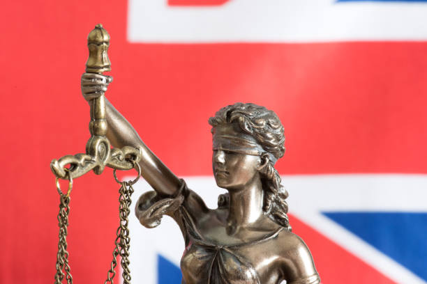istock Flag of Great Britain and the Justitia 1256117909