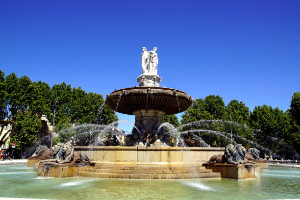 the fountain "la rotonde" in aix-en-provence, france - rotunda fountain imagens e fotografias de stock