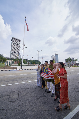 Malaysia multi ethnic adults celebrating their independence day at merdeka square