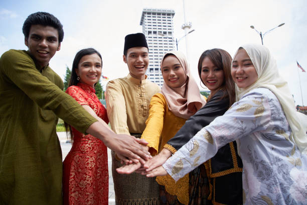 Malaysian ethnic with traditional clothing at Merdeka Square Kuala lumpur Malaysia multi ethnic adults celebrating their independence day at merdeka square merdeka square stock pictures, royalty-free photos & images