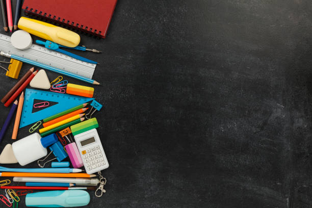 istock School supply on black chalkboard. Copy space for text. Back to education 1256124767