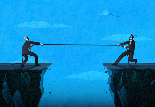 Two businessmen in suit pull the rope at edge of cliff. (Used clipping mask)