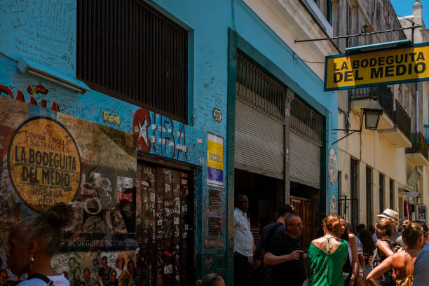 Havana, Cuba - April 28, 2019: the famous Bodeguita del Medio, a place of great cultural and historical renown, frequented by many tourists who want to try the best mojito in the Caribbean country