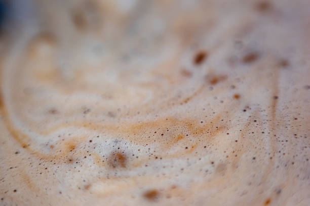 istock Macro bubbles of black coffee foam 1256127709
