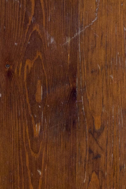 istock brown wood texture with cracks and scratches. wood background for writing text 1256131605