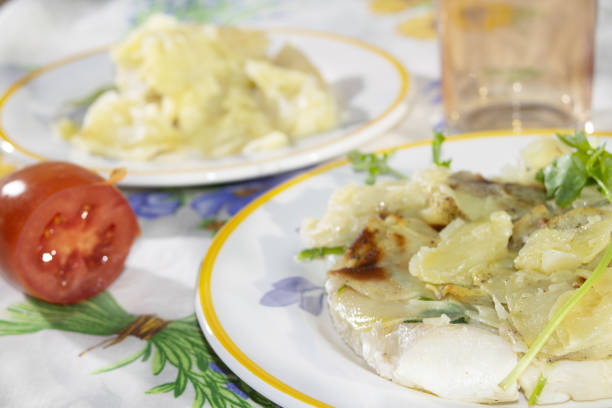 dish of sea bream fillets in potato crust