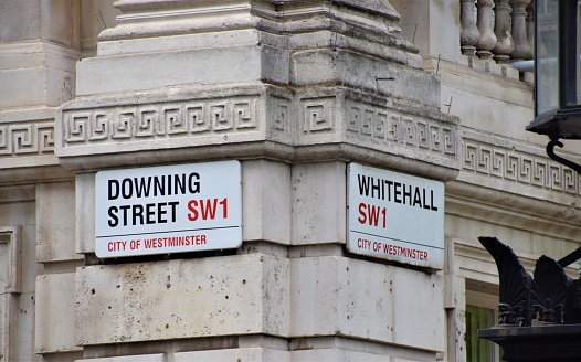 London, United Kingdom - July 10 2020: Downing Street and Whitehall street signs detail
