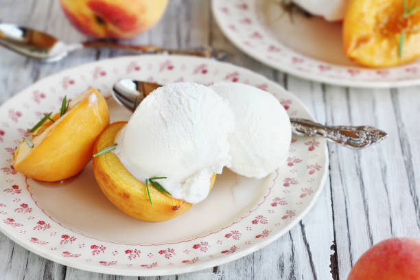 istock Roasted Peaches with Vanilla Ice Cream 1256139337