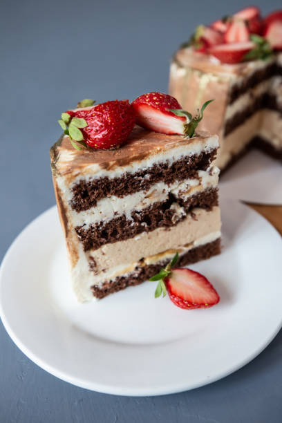 istock strawberry cheesecake cake chocolate, cream and decoration 1256143107