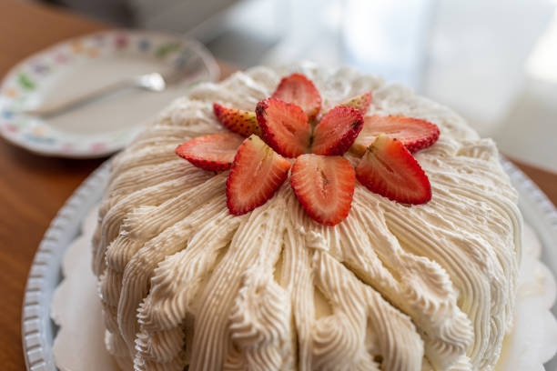istock Strawberry tart with whipped cream served as a dessert. 1256143421