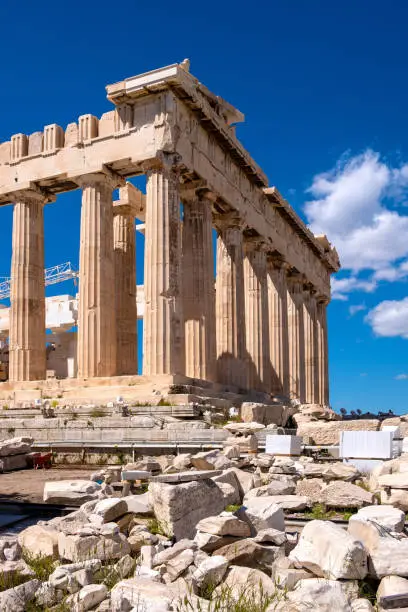 Panoramic view of Parthenon - temple of goddess Athena - within ancient Athenian Acropolis complex atop Acropolis hill in Athens, Greece