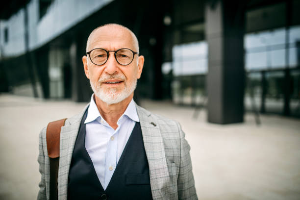 istock Smiling senior businessman 1256148363