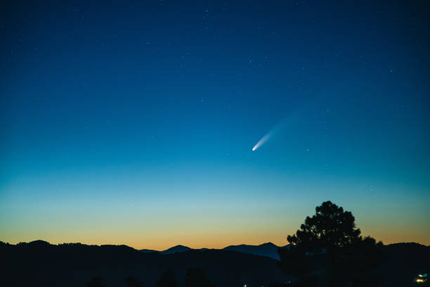 istock Neowise comet against a dark sky in Tuscany, Italy 1256150168