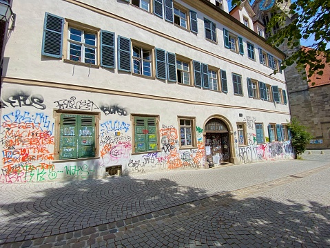 Tübingen, Germany - July, 13 - 2020: A typical college dorm close to the St. Georg church in the old town.