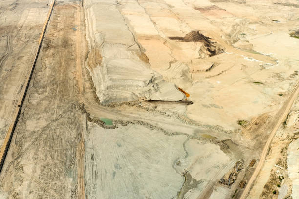 istock Top view of opencast coal mining quarry Natural texture. 1256153605