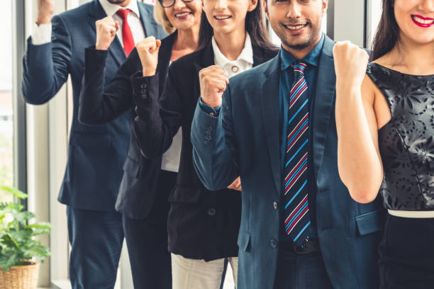 istock Successful business people standing together 1256154769