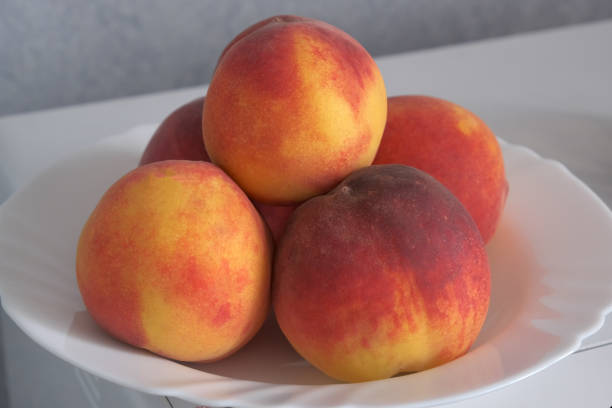 istock Ripe sweet whole peaches 1256157366