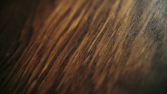 Dark Wood texture close-up. Dolly shot