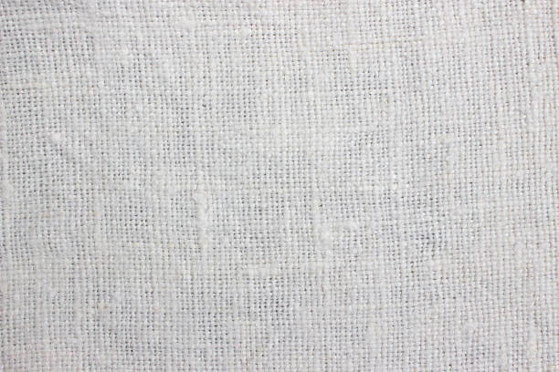 istock Light natural linen texture in white. Linen background. 1256158637