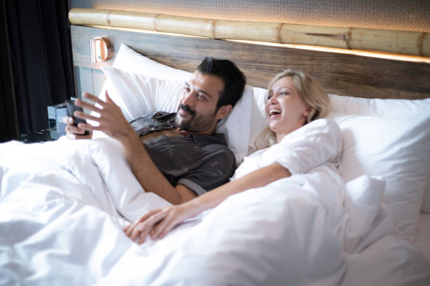 istock Couple fight over for remote TV 1256160919
