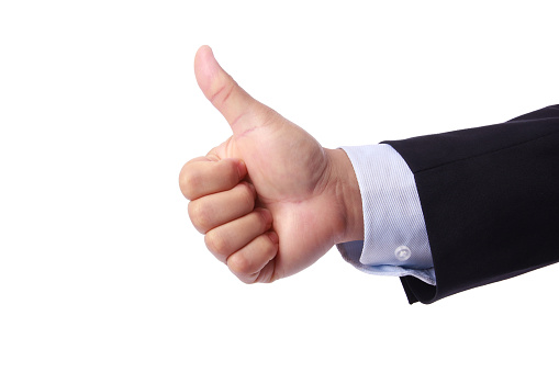 Business man hand showing thumbs up sign, isolated on white background