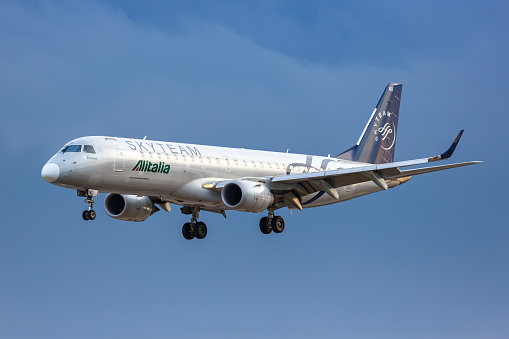 London, United Kingdom – July 7, 2019: Alitalia CityLiner Embraer 190 airplane at London City airport (LCY) in the United Kingdom.