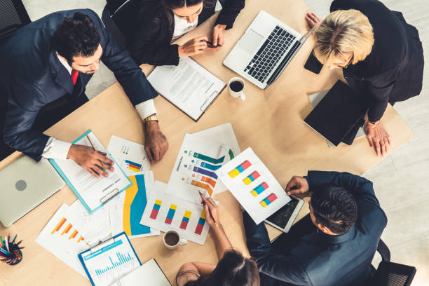 istock Business people group meeting shot from top view 1256168511