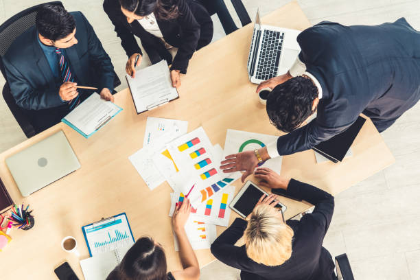 istock Business people group meeting shot from top view 1256169151