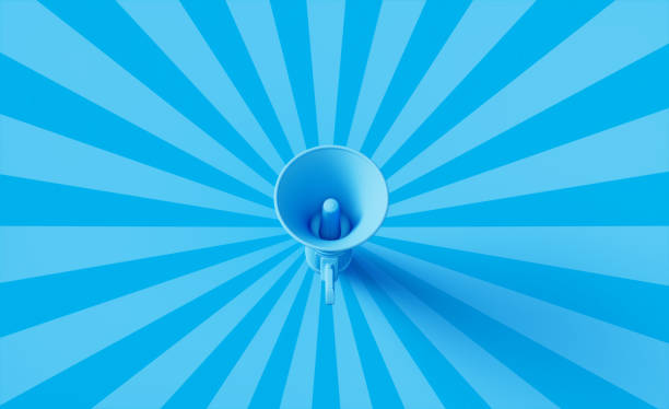 istock Blue Megaphone Sitting on Blue Sunburst Background 1256171675