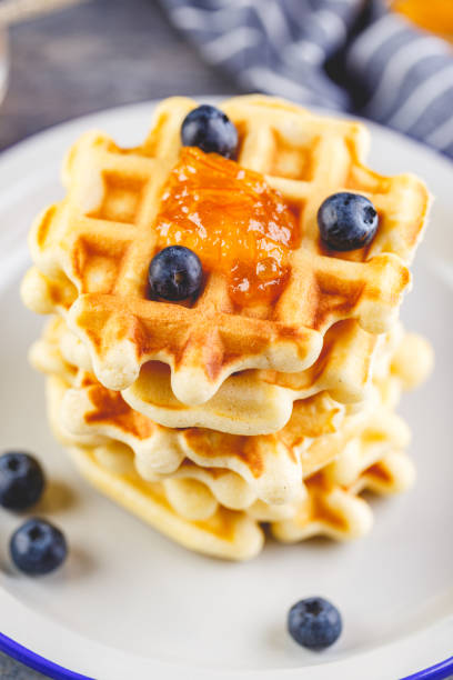 istock Home made Belgian waffles served with berries 1256172847