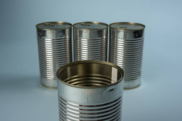 Steel cans with dog food stock photo