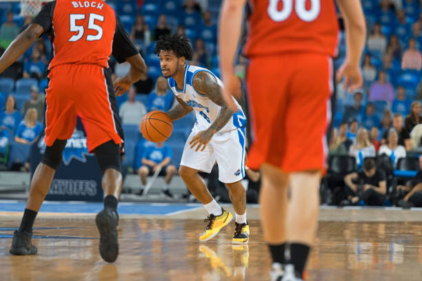 istock Basketball player running with ball 1256180198