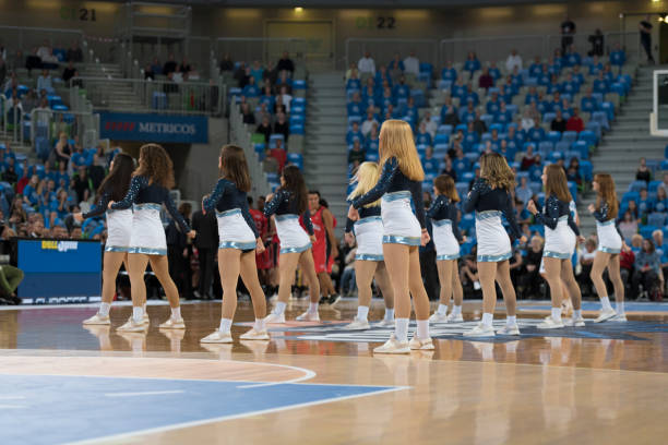 istock Cheerleaders performing in court 1256181329
