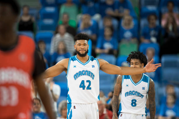 istock Basketball player with arms outstretch 1256181725