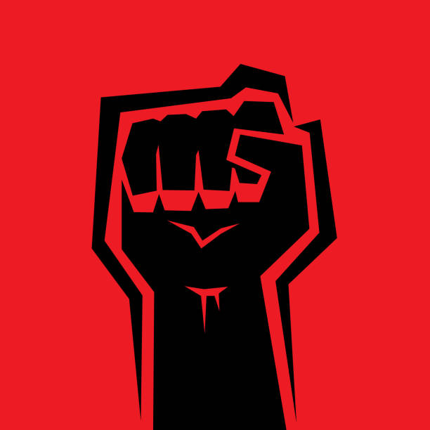 Raised Fist Vector illustration of a black raised fist against a red background. freedom illustrations stock illustrations