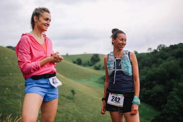 istock Two female runners after a marathon in the nature 1256189937