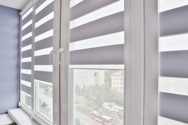 istock Windows with open modern horizontal blinds indoors, closeup 1256195406