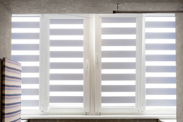 istock Windows with open modern horizontal blinds indoors, closeup 1256195413