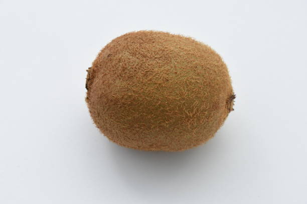 istock Fresh Kiwi fruits on white background 1256195523